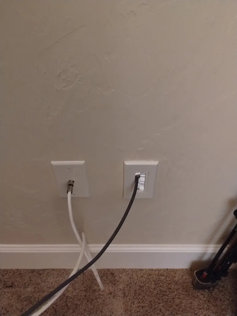Custom wall brush plate where the cable is coming through the wall inside